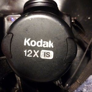 Kodak brand easy camera and Pentax video camera
